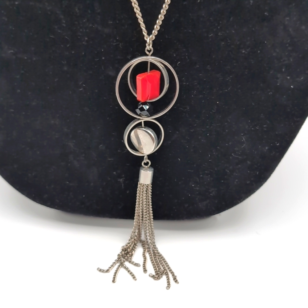Statement Silver Toned Long Tassel Necklace With Circular Mobile Focus